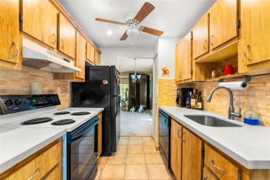 Spacious 2-bed, 1.5-bath condo in Fairways of Tamarac 55+ on Colony West Country Club in Florida - for sale on GolfHomes.com, golf home, golf lot