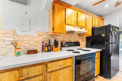 Spacious 2-bed, 1.5-bath condo in Fairways of Tamarac 55+ on Colony West Country Club in Florida - for sale on GolfHomes.com, golf home, golf lot