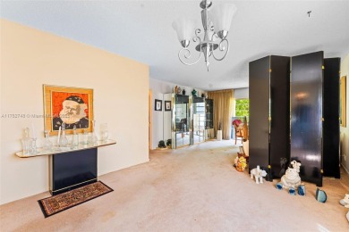 Spacious 2-bed, 1.5-bath condo in Fairways of Tamarac 55+ on Colony West Country Club in Florida - for sale on GolfHomes.com, golf home, golf lot