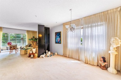 Spacious 2-bed, 1.5-bath condo in Fairways of Tamarac 55+ on Colony West Country Club in Florida - for sale on GolfHomes.com, golf home, golf lot
