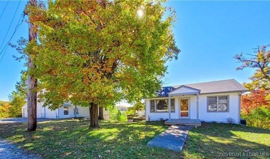 Unique and rare lake property minutes from restaurants, shopping on Tan-Tar-A Golf Club in Missouri - for sale on GolfHomes.com, golf home, golf lot