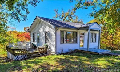 Unique and rare lake property minutes from restaurants, shopping on Tan-Tar-A Golf Club in Missouri - for sale on GolfHomes.com, golf home, golf lot