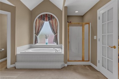 Welcome to your dream home, an all-brick w/ side load three car on Riverfront Golf Club in Virginia - for sale on GolfHomes.com, golf home, golf lot