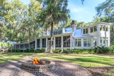 Located on Rice Gate Pond, this magnificent home offers a on Old Tabby Links on Spring Island in South Carolina - for sale on GolfHomes.com, golf home, golf lot