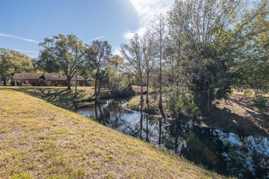 Cold, snow, ice...no more!  Instead sit on your front porch on Beacon Woods Golf Club in Florida - for sale on GolfHomes.com, golf home, golf lot