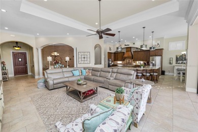 Discover the epitome of luxury living at 2961 Sanctuary Circle on Grasslands Golf and Country Club in Florida - for sale on GolfHomes.com, golf home, golf lot