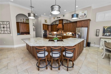 Discover the epitome of luxury living at 2961 Sanctuary Circle on Grasslands Golf and Country Club in Florida - for sale on GolfHomes.com, golf home, golf lot