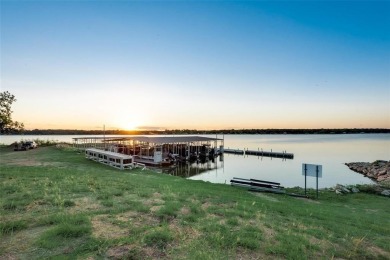 Charming 5 bed, 4 bath home in the only 24-7 gated & guarded on The Golf Club at Resort Eagle Mountain Lake in Texas - for sale on GolfHomes.com, golf home, golf lot
