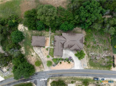Located in the picturesque lake community of Lago Vista, this on Highland Lakes Golf Course in Texas - for sale on GolfHomes.com, golf home, golf lot