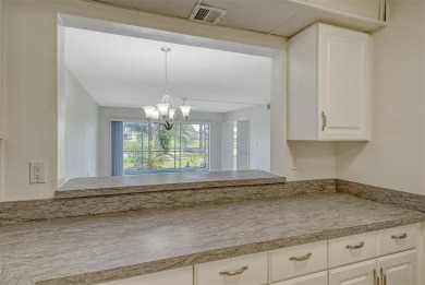 One or more photo(s) has been virtually staged. Rarely available on Palm Aire Country Club of Sarasota in Florida - for sale on GolfHomes.com, golf home, golf lot