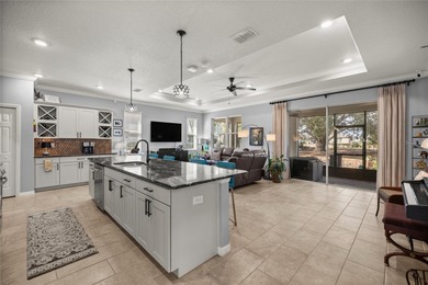 Warm & Inviting Former Model Home in Indigo East -- Upgraded on Candler Hills Golf and Country Club in Florida - for sale on GolfHomes.com, golf home, golf lot