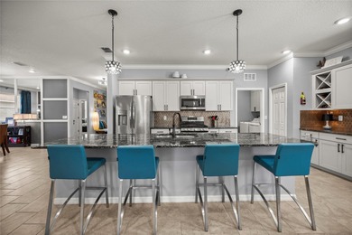 Warm & Inviting Former Model Home in Indigo East -- Upgraded on Candler Hills Golf and Country Club in Florida - for sale on GolfHomes.com, golf home, golf lot