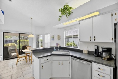 Experience the ultimate Florida lifestyle in this beautifully on Sandpiper Golf Club in Florida - for sale on GolfHomes.com, golf home, golf lot