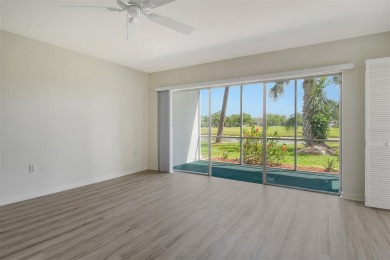 One or more photo(s) has been virtually staged. Rarely available on Palm Aire Country Club of Sarasota in Florida - for sale on GolfHomes.com, golf home, golf lot