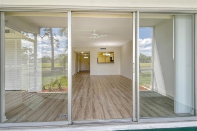 One or more photo(s) has been virtually staged. Rarely available on Palm Aire Country Club of Sarasota in Florida - for sale on GolfHomes.com, golf home, golf lot