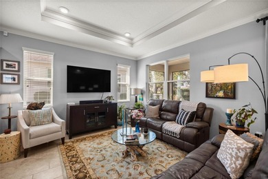 Warm & Inviting Former Model Home in Indigo East -- Upgraded on Candler Hills Golf and Country Club in Florida - for sale on GolfHomes.com, golf home, golf lot