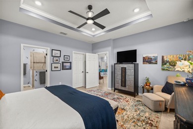 Warm & Inviting Former Model Home in Indigo East -- Upgraded on Candler Hills Golf and Country Club in Florida - for sale on GolfHomes.com, golf home, golf lot