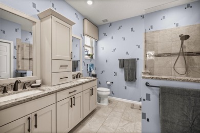 Warm & Inviting Former Model Home in Indigo East -- Upgraded on Candler Hills Golf and Country Club in Florida - for sale on GolfHomes.com, golf home, golf lot