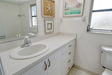 One or more photo(s) has been virtually staged. Rarely available on Palm Aire Country Club of Sarasota in Florida - for sale on GolfHomes.com, golf home, golf lot