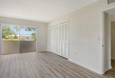 One or more photo(s) has been virtually staged. Rarely available on Palm Aire Country Club of Sarasota in Florida - for sale on GolfHomes.com, golf home, golf lot