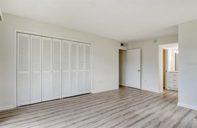 One or more photo(s) has been virtually staged. Rarely available on Palm Aire Country Club of Sarasota in Florida - for sale on GolfHomes.com, golf home, golf lot