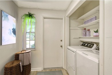 One or more photo(s) has been virtually staged. Rarely available on Palm Aire Country Club of Sarasota in Florida - for sale on GolfHomes.com, golf home, golf lot