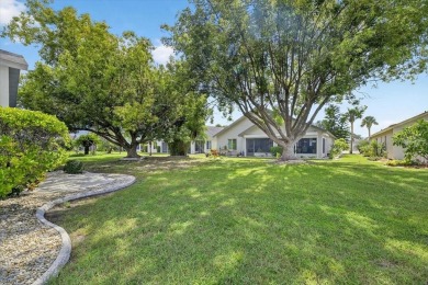 Experience the ultimate Florida lifestyle in this beautifully on Sandpiper Golf Club in Florida - for sale on GolfHomes.com, golf home, golf lot