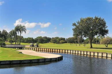 One or more photo(s) has been virtually staged. Rarely available on Palm Aire Country Club of Sarasota in Florida - for sale on GolfHomes.com, golf home, golf lot