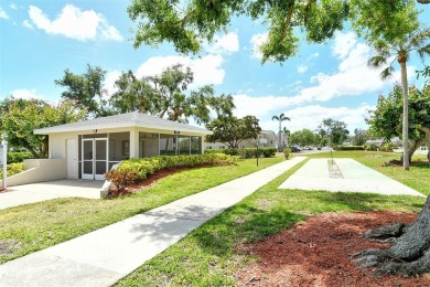 One or more photo(s) has been virtually staged. Rarely available on Palm Aire Country Club of Sarasota in Florida - for sale on GolfHomes.com, golf home, golf lot