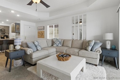 Charming Lakefront Condo in a Small, Sought-After Community! on Seasons Ridge At Four Seasons in Missouri - for sale on GolfHomes.com, golf home, golf lot