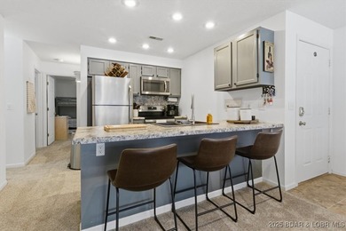 Charming Lakefront Condo in a Small, Sought-After Community! on Seasons Ridge At Four Seasons in Missouri - for sale on GolfHomes.com, golf home, golf lot