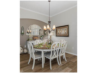 Tucked away on a quiet street with peaceful pond views, this on Heritage Springs Country Club in Florida - for sale on GolfHomes.com, golf home, golf lot