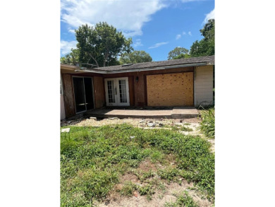 Fixer upper in prime location 10 mins away from Anna Maria on Bradenton Country Club in Florida - for sale on GolfHomes.com, golf home, golf lot