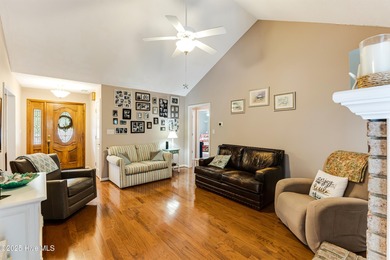 Tucked at the end of a cul-de-sac, this stunning brick home on Lockwood Folly Country Club in North Carolina - for sale on GolfHomes.com, golf home, golf lot