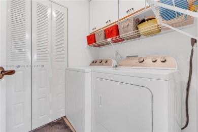 This beautifully renovated apartment seamlessly blends modern on Sunrise Lakes Phase IV Golf Course in Florida - for sale on GolfHomes.com, golf home, golf lot