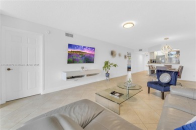 This beautifully renovated apartment seamlessly blends modern on Sunrise Lakes Phase IV Golf Course in Florida - for sale on GolfHomes.com, golf home, golf lot