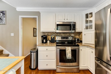 Tucked at the end of a cul-de-sac, this stunning brick home on Lockwood Folly Country Club in North Carolina - for sale on GolfHomes.com, golf home, golf lot