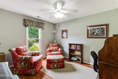 Tucked at the end of a cul-de-sac, this stunning brick home on Lockwood Folly Country Club in North Carolina - for sale on GolfHomes.com, golf home, golf lot