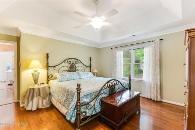 Tucked at the end of a cul-de-sac, this stunning brick home on Lockwood Folly Country Club in North Carolina - for sale on GolfHomes.com, golf home, golf lot