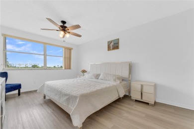 This beautifully renovated apartment seamlessly blends modern on Sunrise Lakes Phase IV Golf Course in Florida - for sale on GolfHomes.com, golf home, golf lot