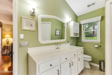 Tucked at the end of a cul-de-sac, this stunning brick home on Lockwood Folly Country Club in North Carolina - for sale on GolfHomes.com, golf home, golf lot