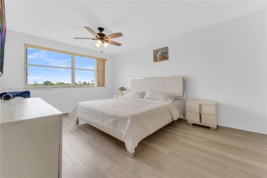 This beautifully renovated apartment seamlessly blends modern on Sunrise Lakes Phase IV Golf Course in Florida - for sale on GolfHomes.com, golf home, golf lot