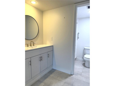 Oversized corner unit with 2 bedrooms & two full baths. Includes on Pine Island Ridge Country Club in Florida - for sale on GolfHomes.com, golf home, golf lot