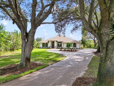 Welcome to this stunning 4 bedroom pool home in the gated on Martin Downs Country Club in Florida - for sale on GolfHomes.com, golf home, golf lot