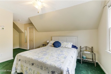 Tucked at the end of a cul-de-sac, this stunning brick home on Lockwood Folly Country Club in North Carolina - for sale on GolfHomes.com, golf home, golf lot