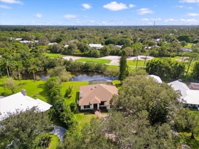 Welcome to this stunning 4 bedroom pool home in the gated on Martin Downs Country Club in Florida - for sale on GolfHomes.com, golf home, golf lot