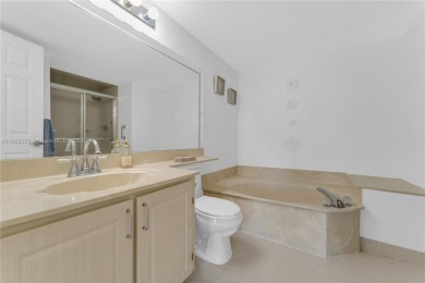 This beautifully renovated apartment seamlessly blends modern on Sunrise Lakes Phase IV Golf Course in Florida - for sale on GolfHomes.com, golf home, golf lot