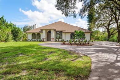 Welcome to this stunning 4 bedroom pool home in the gated on Martin Downs Country Club in Florida - for sale on GolfHomes.com, golf home, golf lot