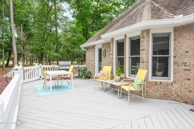 Tucked at the end of a cul-de-sac, this stunning brick home on Lockwood Folly Country Club in North Carolina - for sale on GolfHomes.com, golf home, golf lot