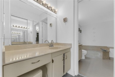 This beautifully renovated apartment seamlessly blends modern on Sunrise Lakes Phase IV Golf Course in Florida - for sale on GolfHomes.com, golf home, golf lot